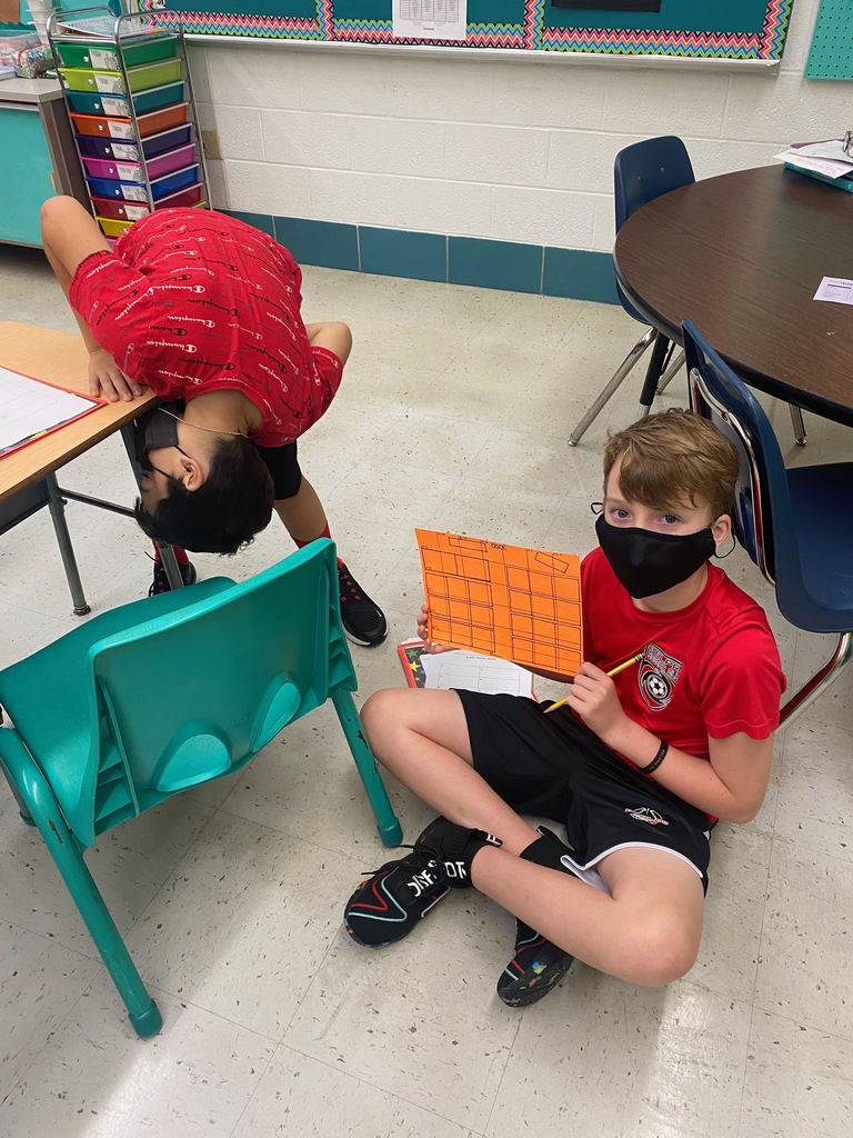 Fifth grade students have a little fun studying for their geography quiz!