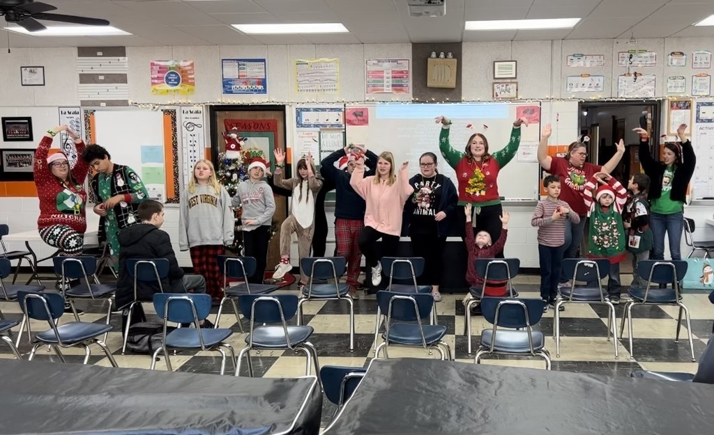 Caroling, caroling through the town - Miss Bonar's class and our Lighthouse students shared Christmas cheer!