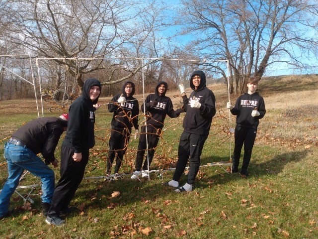 Boys bball helping with Holiday Lights