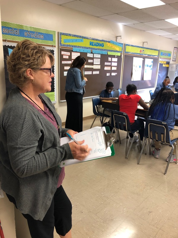 Mary Miller and Ally Trew observe a classroom